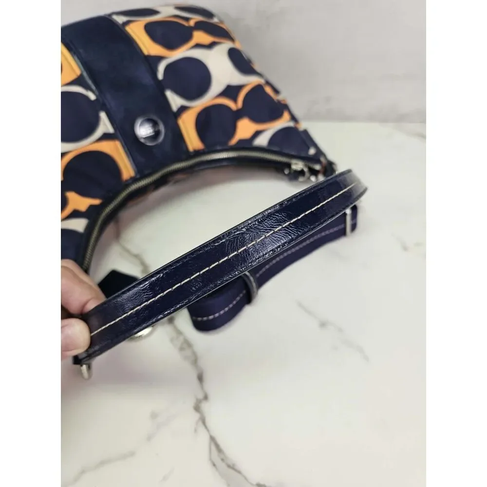 Coach Poppy Linear Signature 